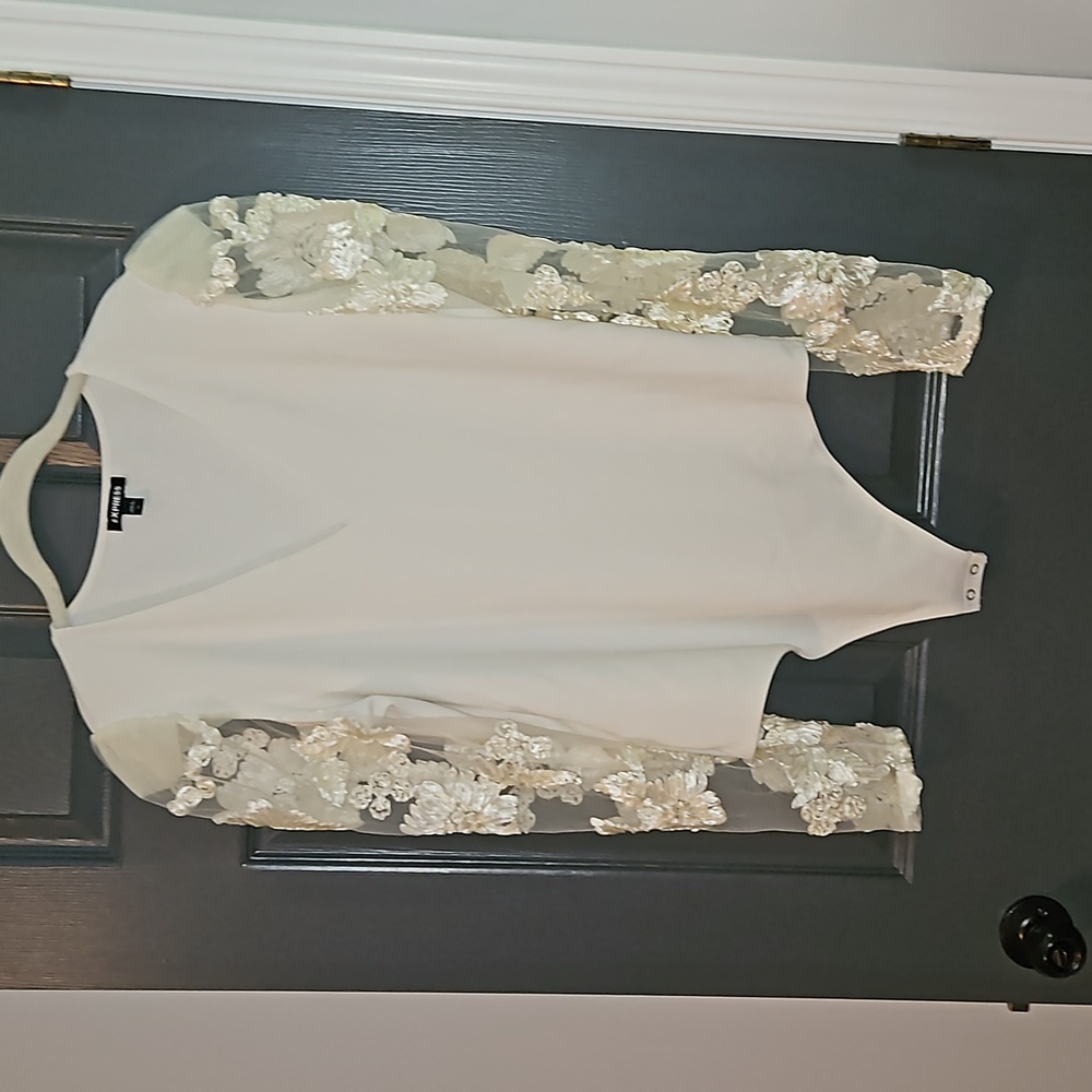 XL Express cream coloured bodysuit.